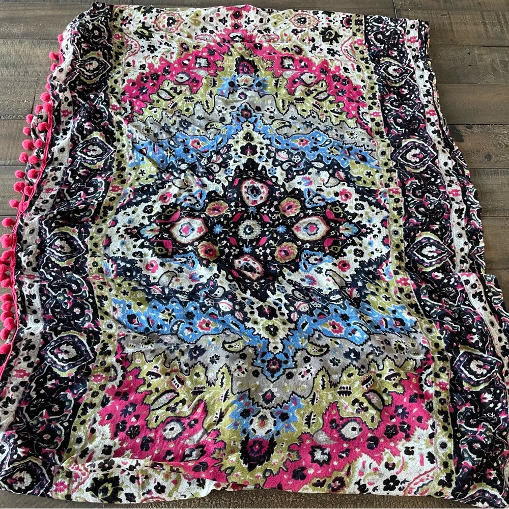 Colorful Patterned Blanket with Pom Poms